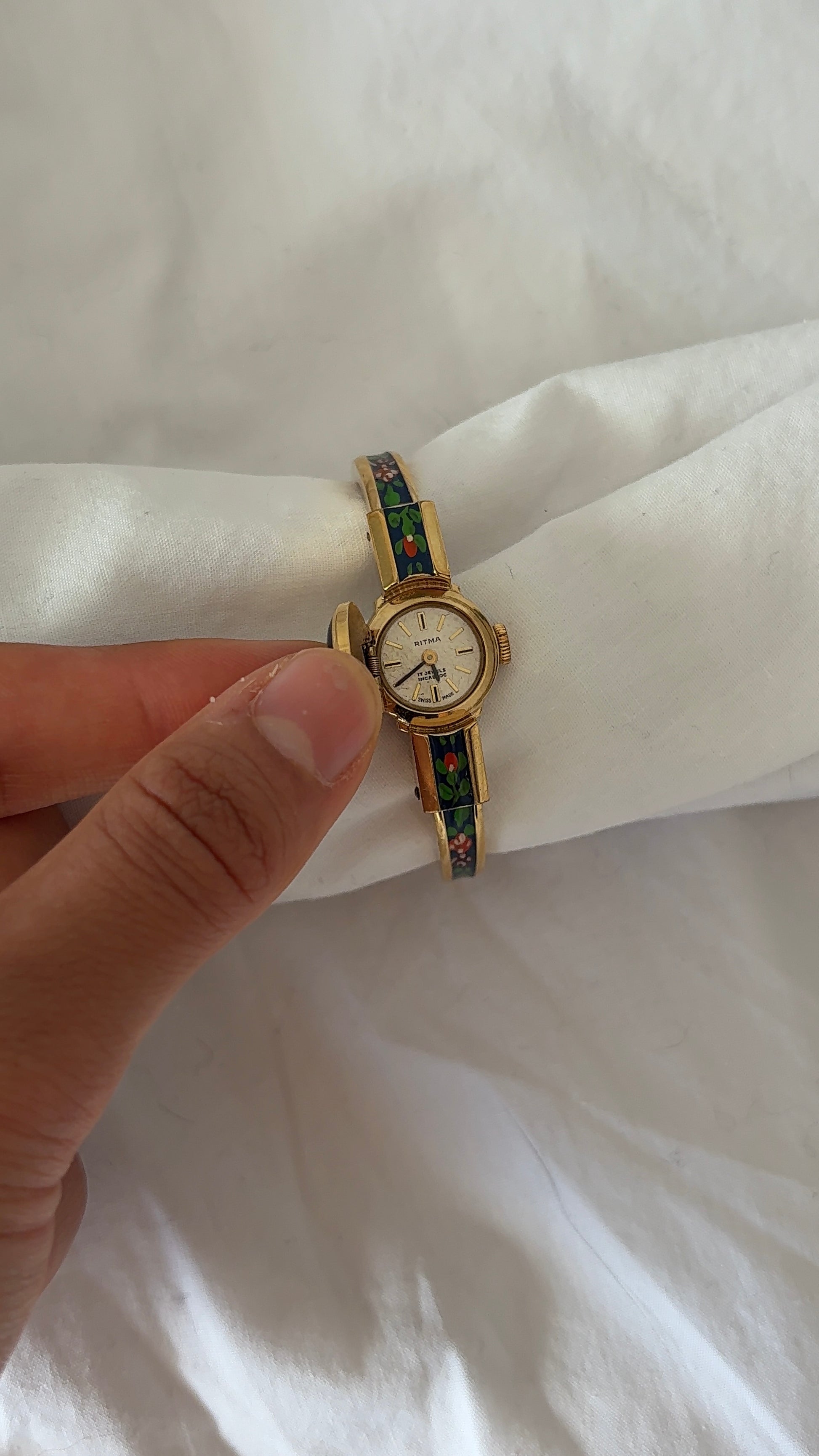 WORKING Navy Floral Peek-A-Boo Watch