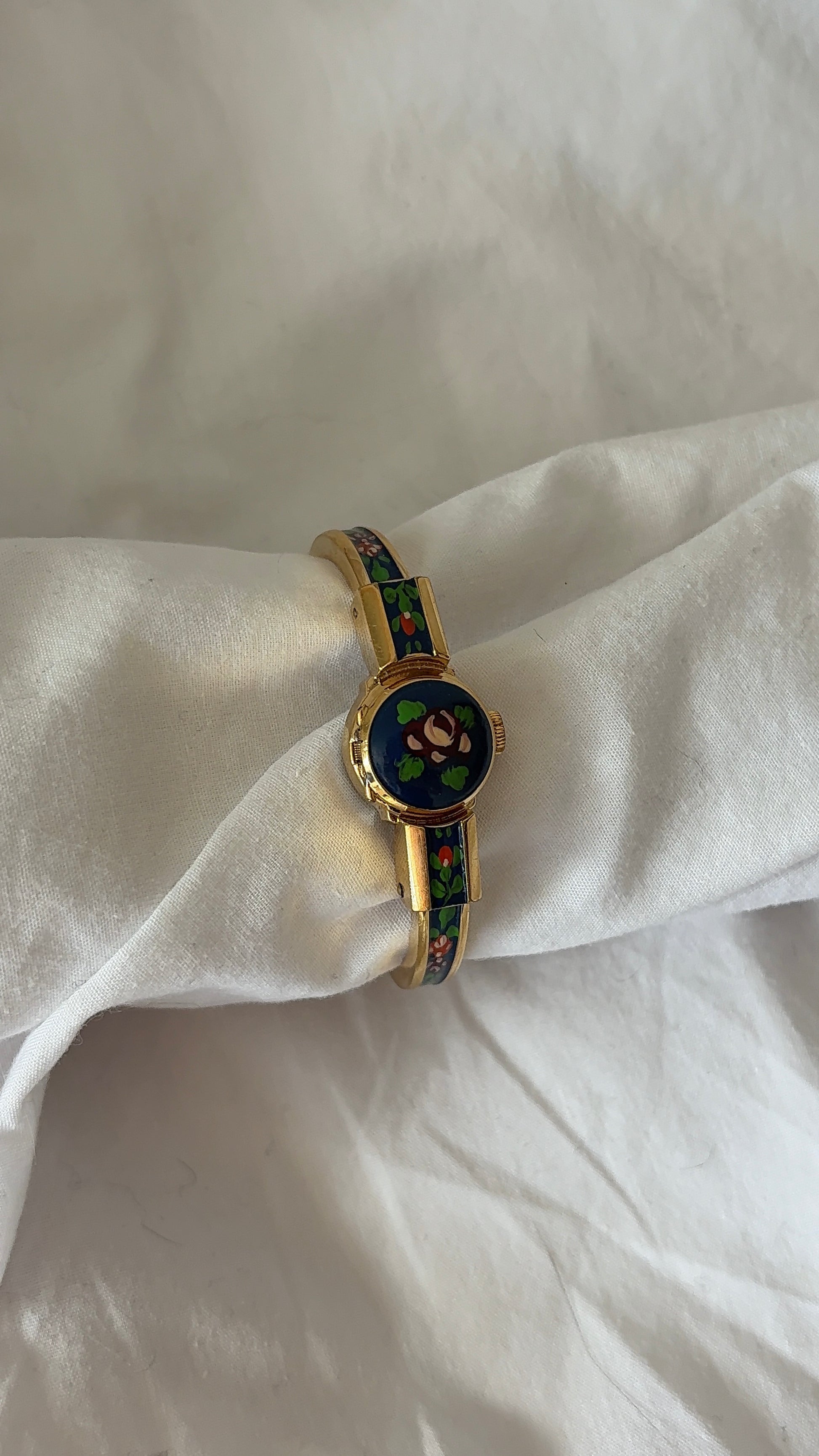 WORKING Navy Floral Peek-A-Boo Watch
