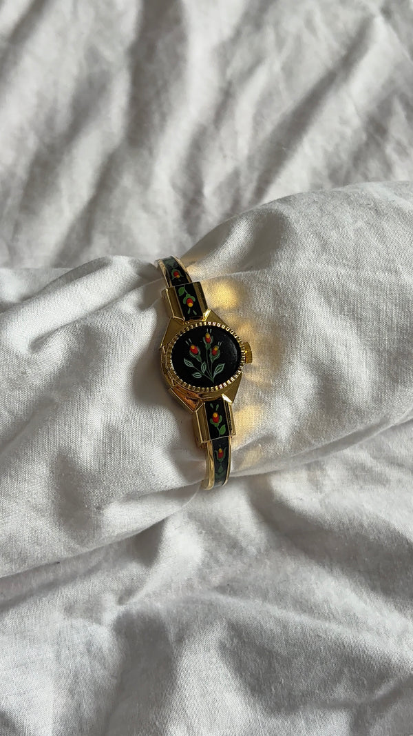WORKING Black Floral Peek-a-Boo Watch