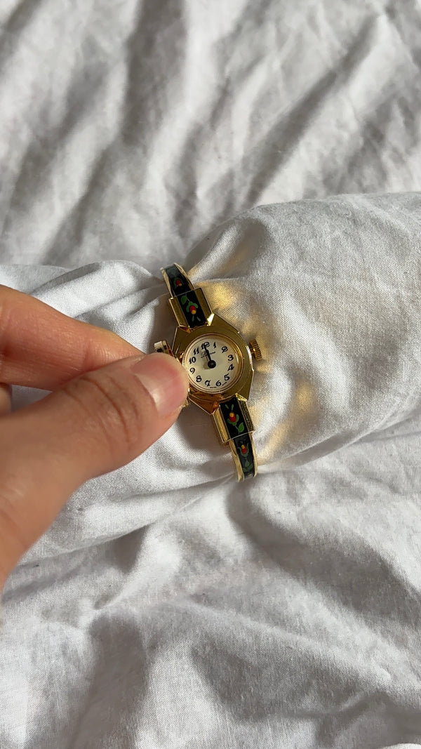 WORKING Black Floral Peek-a-Boo Watch